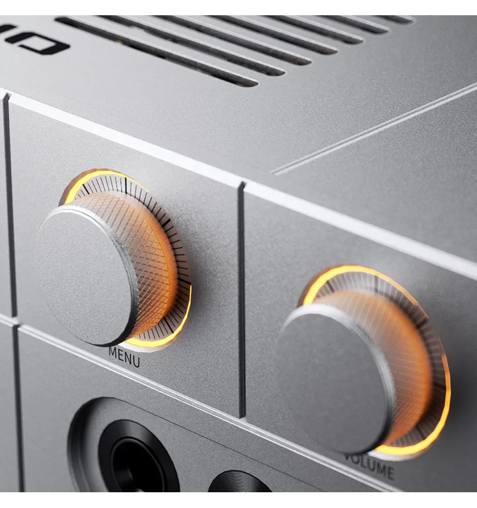Primer plano de dos mandos giratorios iluminados y una toma de auriculares en un dispositivo de audio plateado.