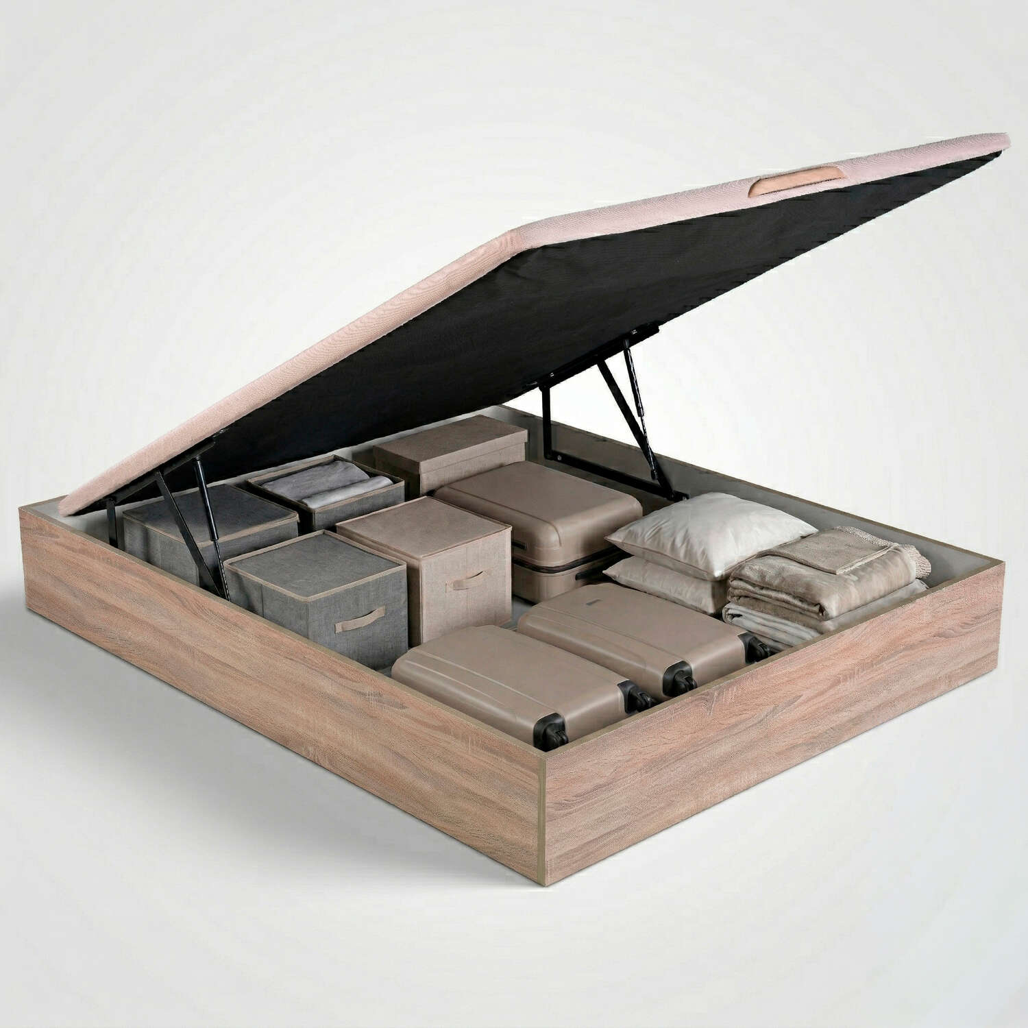 Una cama con almacenamiento de madera abierta, llena de cajas, maletas y cojines.