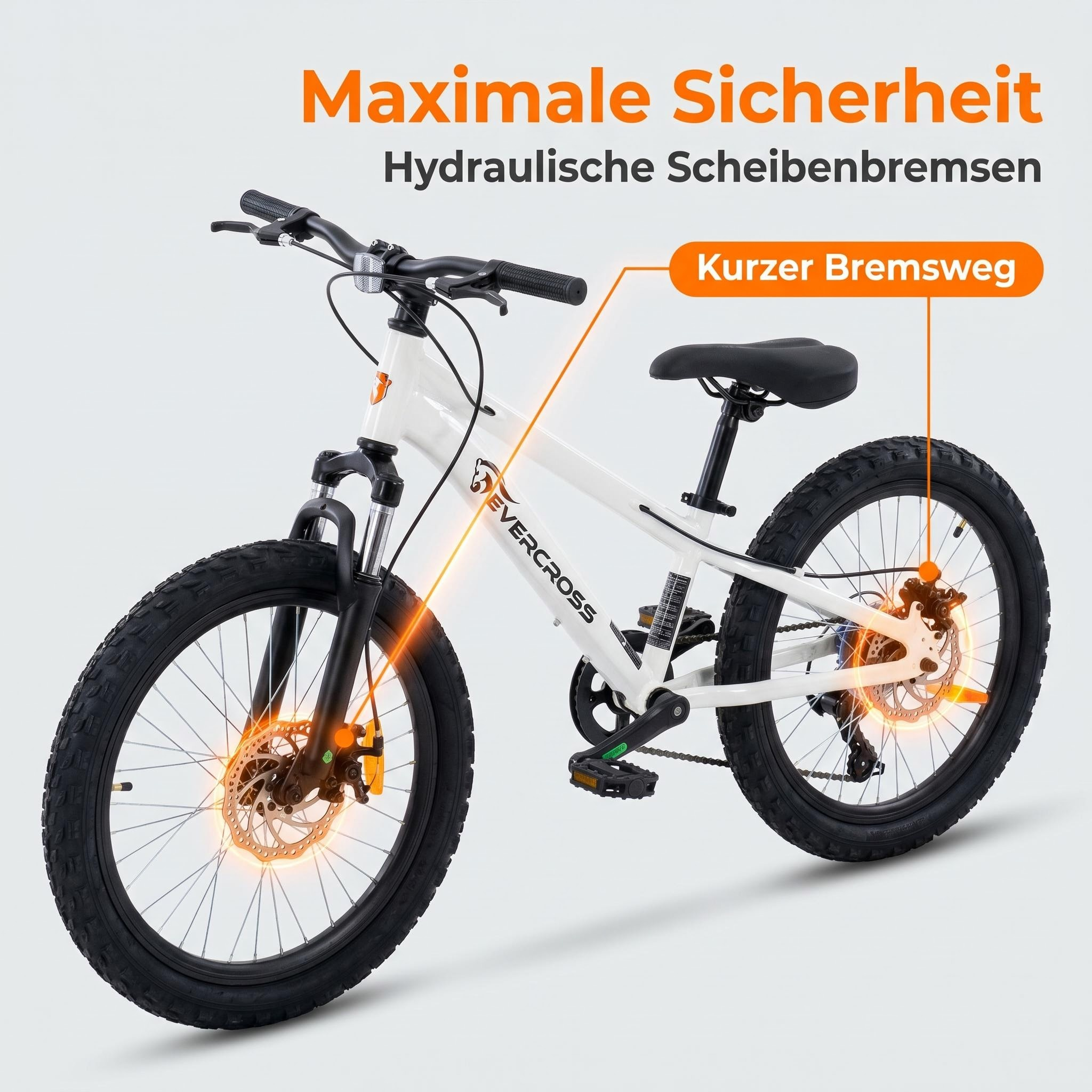 Ein weißes Evercross Kinder-Mountainbike mit hervorgehobenen hydraulischen Scheibenbremsen.