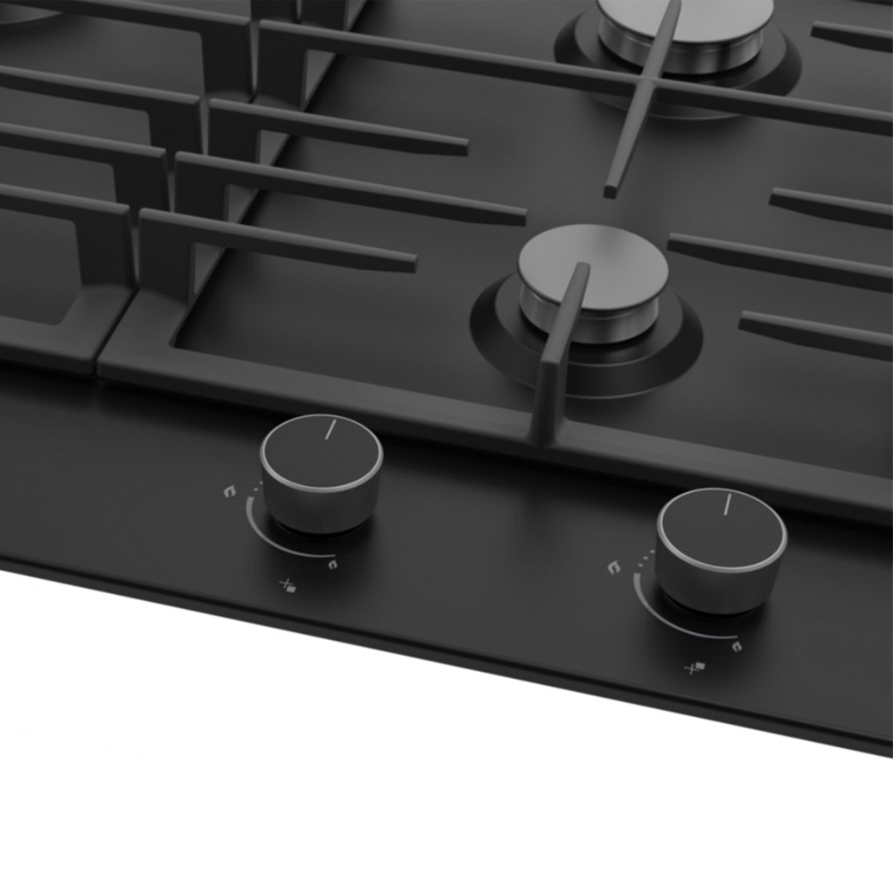 A black gas cooktop with two silver knobs in the foreground and burners above.
