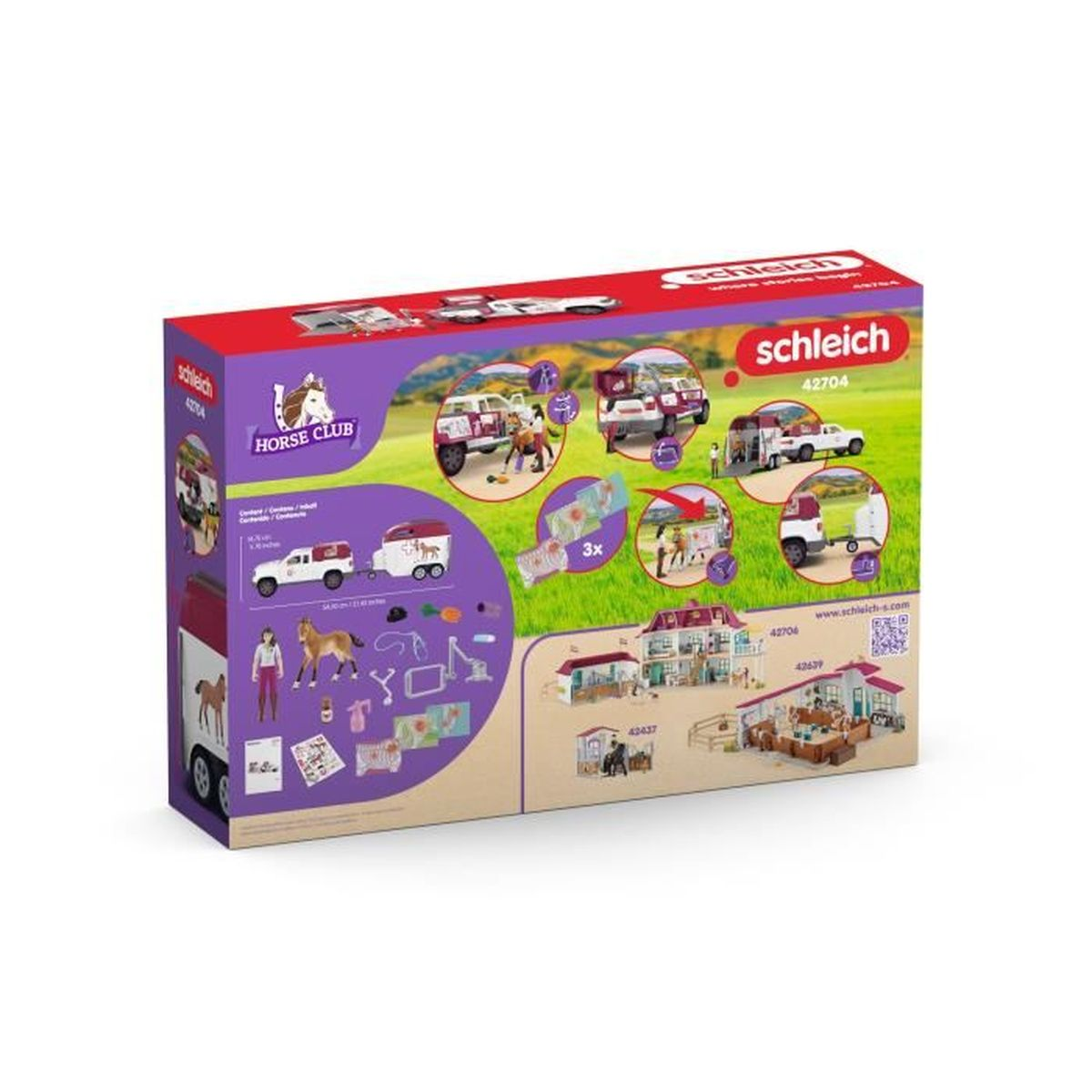 Schleich Horse Club Spielset-Karton mit Pferdeanhänger, Figuren und Zubehör vor grüner Wiese.