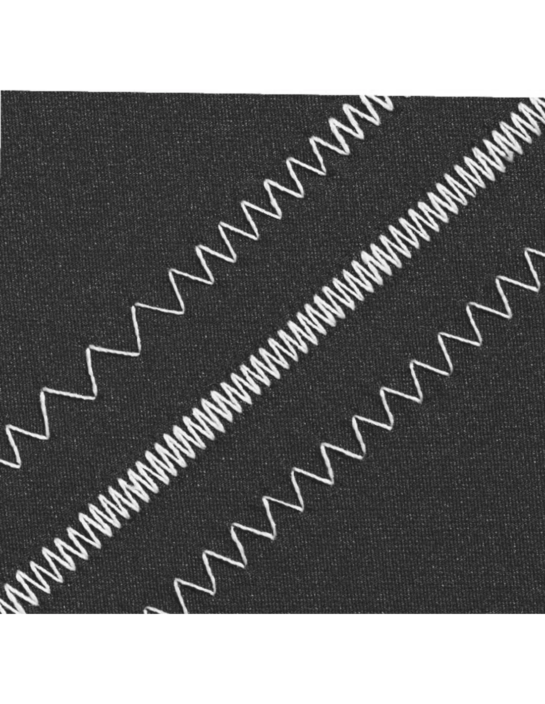 Three white zigzag stitches in different patterns on dark fabric.
