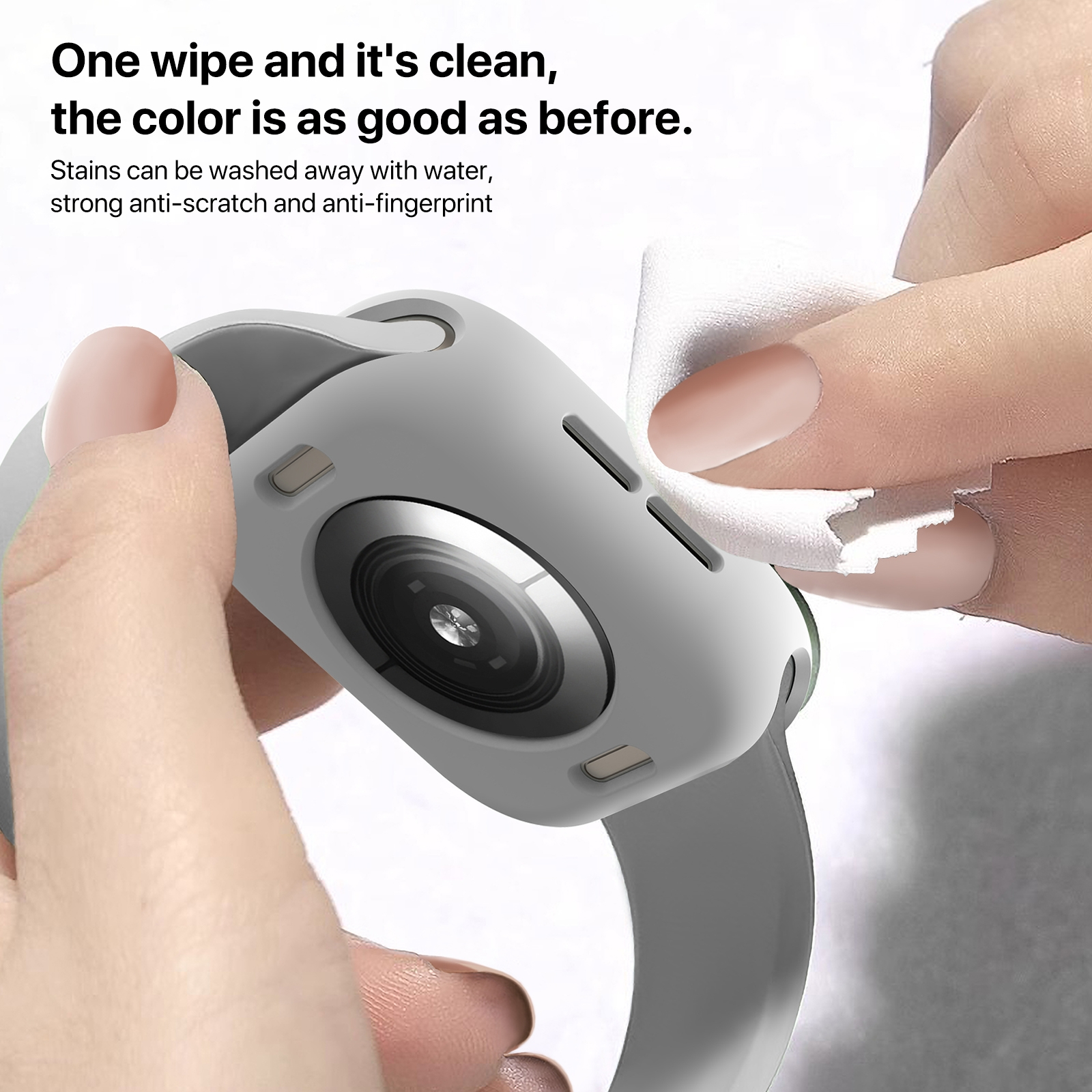 Hände reinigen eine graue Smartwatch-Hülle mit einem weißen Tuch.