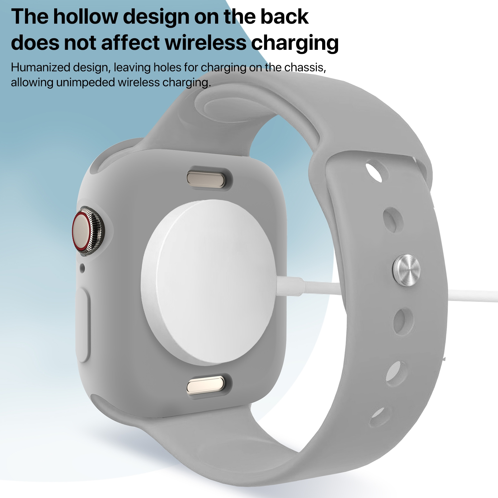 Eine graue Smartwatch mit einem weißen magnetischen Ladekabel auf der Rückseite vor blauem Hintergrund.