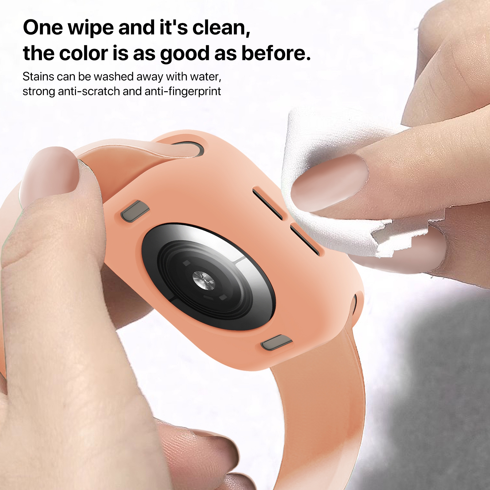 Eine Hand wischt eine rosafarbene Smartwatch-Hülle mit einem weißen Tuch ab.
