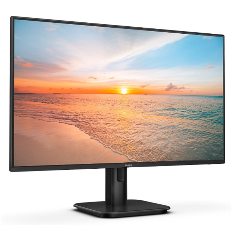 Siyah bir Philips monitör, beyaz arka planda sahil ve okyanus üzerinde gün batımını gösterir.