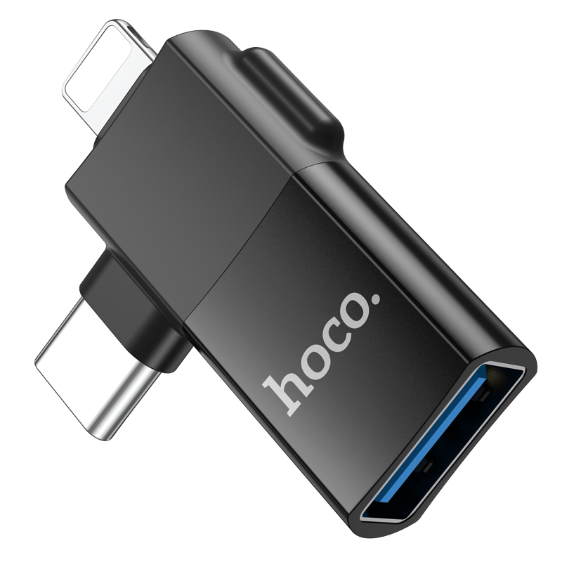 Un adaptador USB hoco. negro con conectores Tipo-C y Lightning sobre fondo blanco.