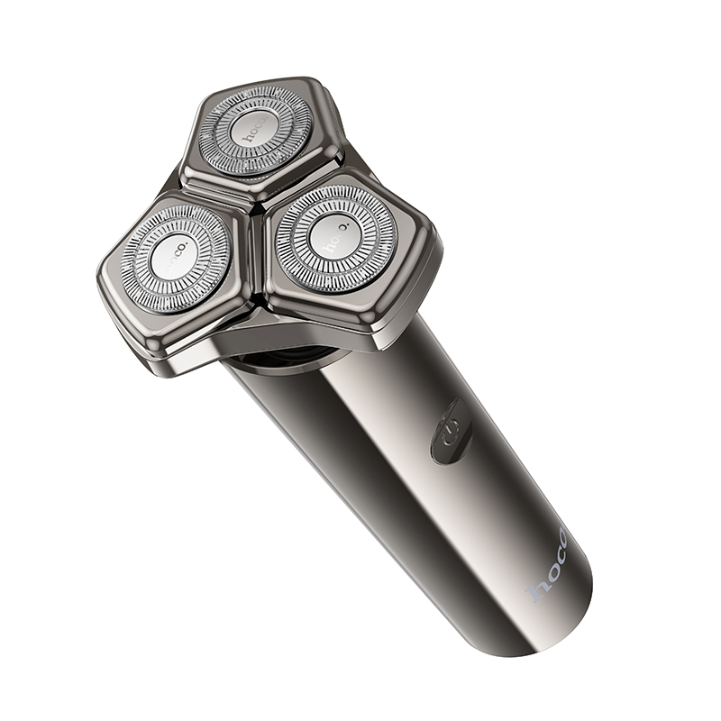 Rasoio elettrico grigio metallizzato con design a tre teste rotanti e pulsante di accensione sul manico.