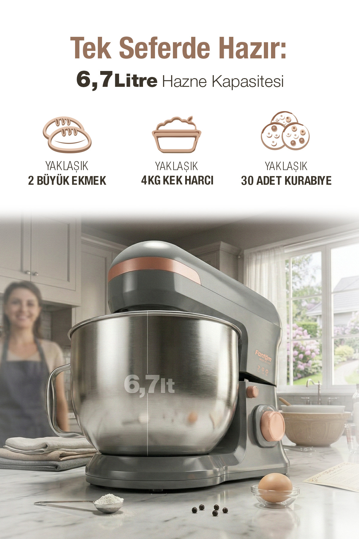 Mermer tezgahta 6.7 litre çelik kaseli gri mutfak şefi ve arka planda mutfak.