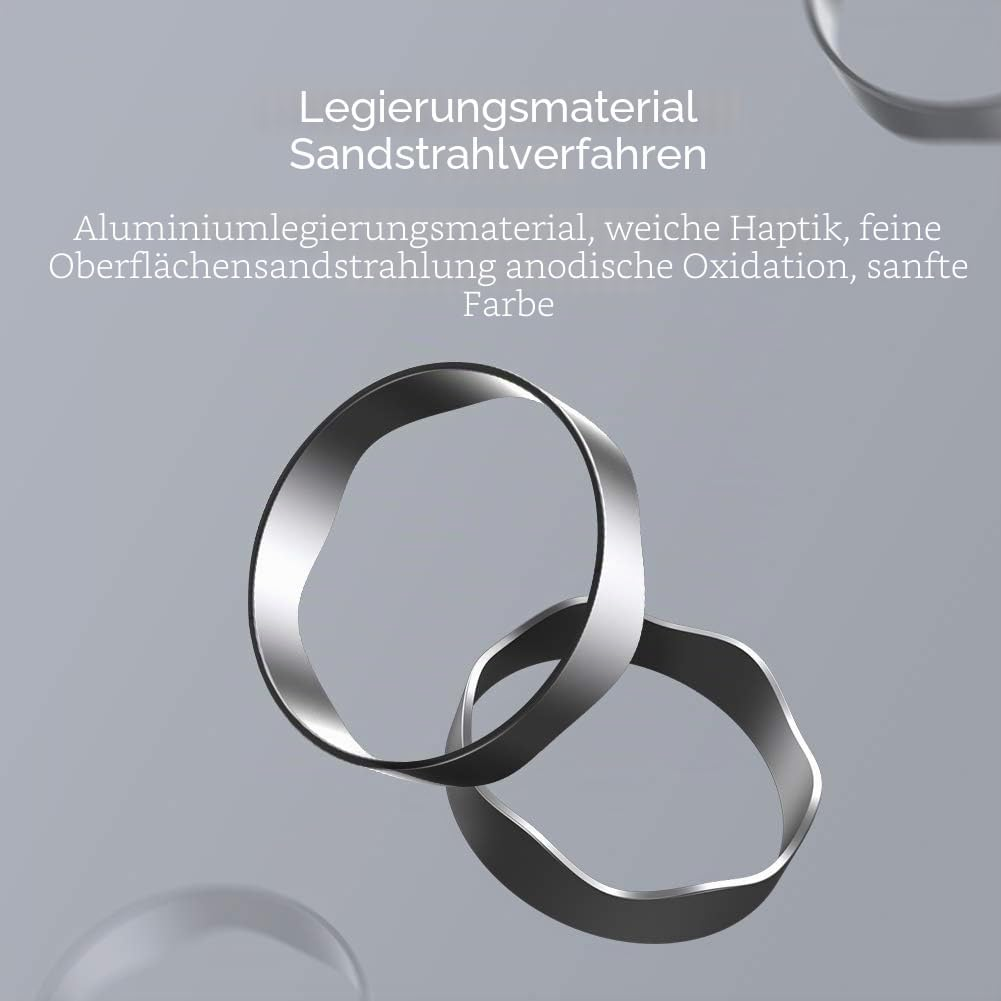 Zwei graue Metallringe schweben vor einem grauen Hintergrund mit deutschem Text.