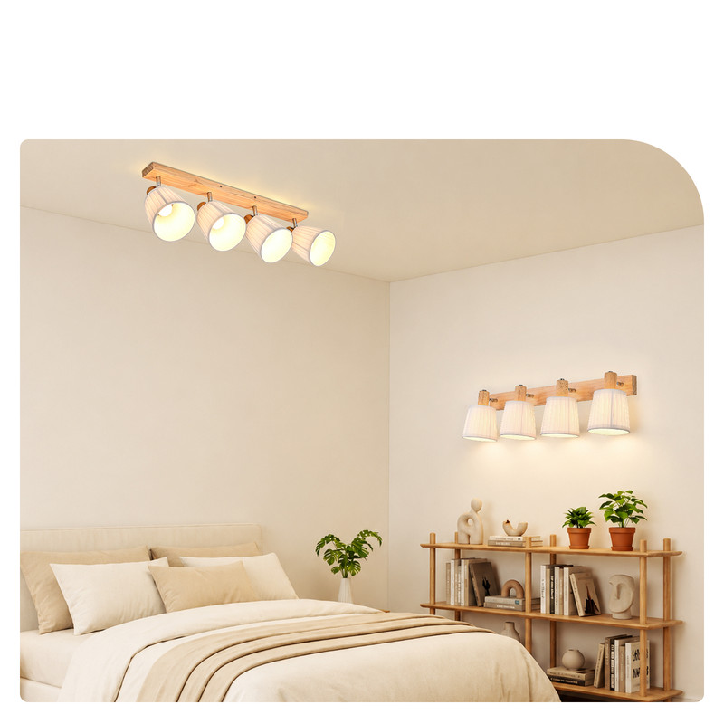 Schlafzimmer mit Holzbett, passenden Decken- und Wandleuchten im skandinavischen Stil und einem Regal mit Pflanzen.