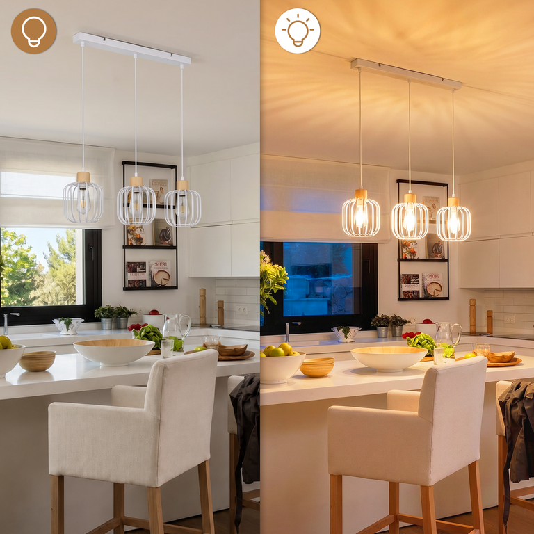 Moderne weiße Pendelleuchten mit Holzdetails hängen über einer Kücheninsel, links aus und rechts beleuchtet.