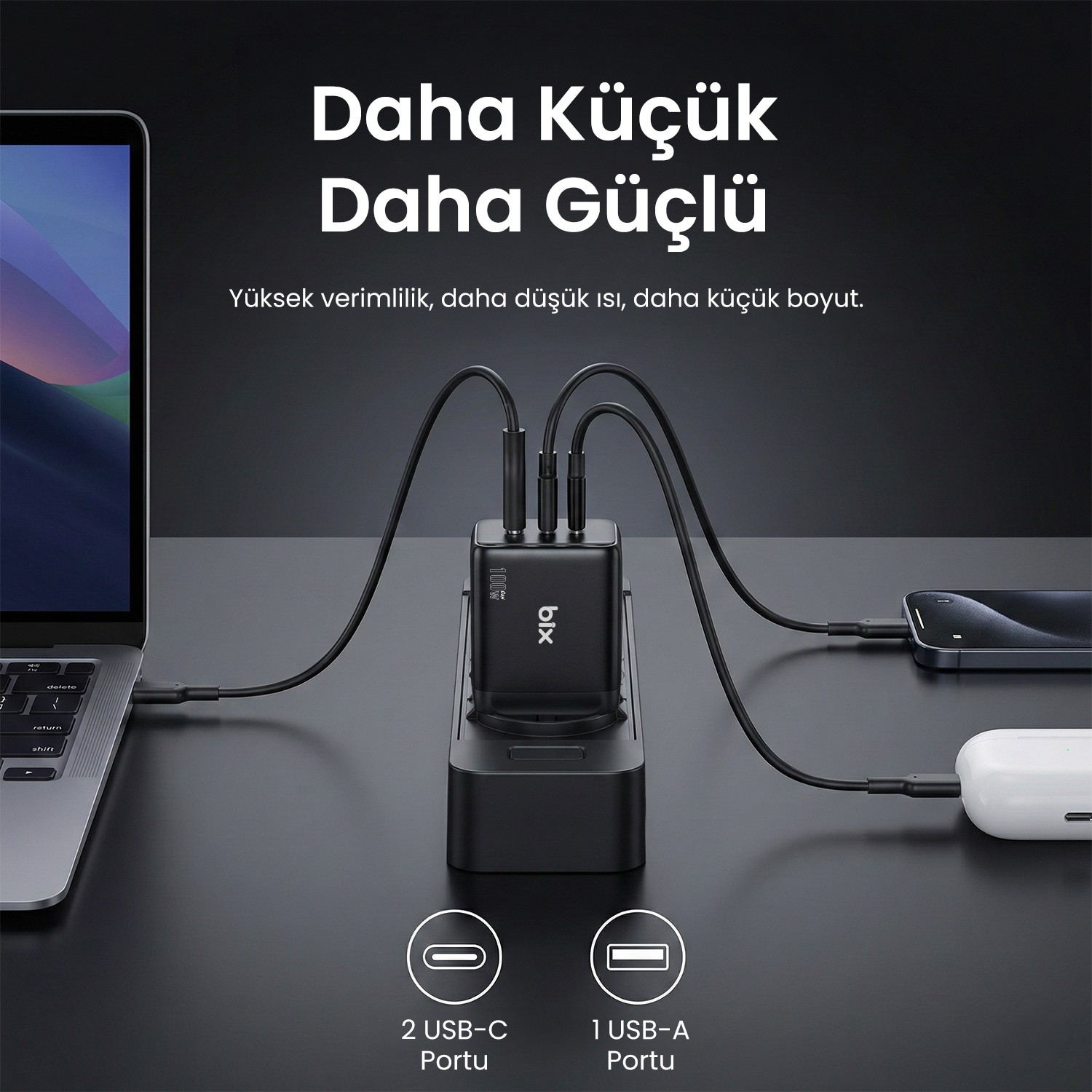 Koyu zemin üzerinde dizüstü bilgisayar, telefon ve kulaklığa bağlı siyah çok portlu şarj cihazı.