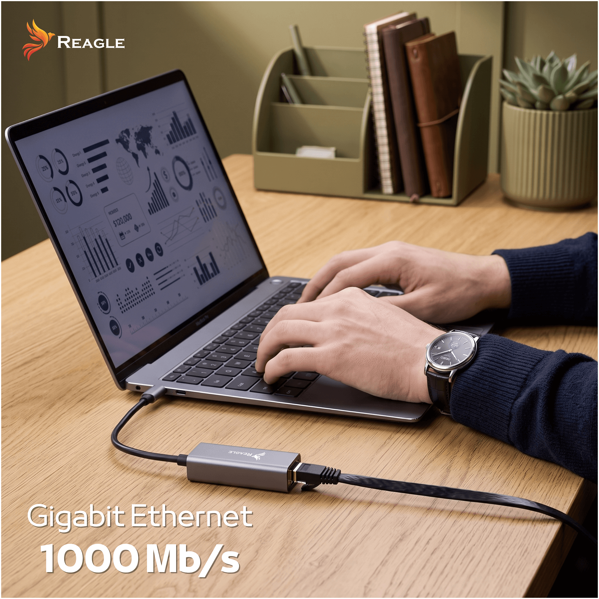 Una persona digita su un laptop collegato a un adattatore ethernet.