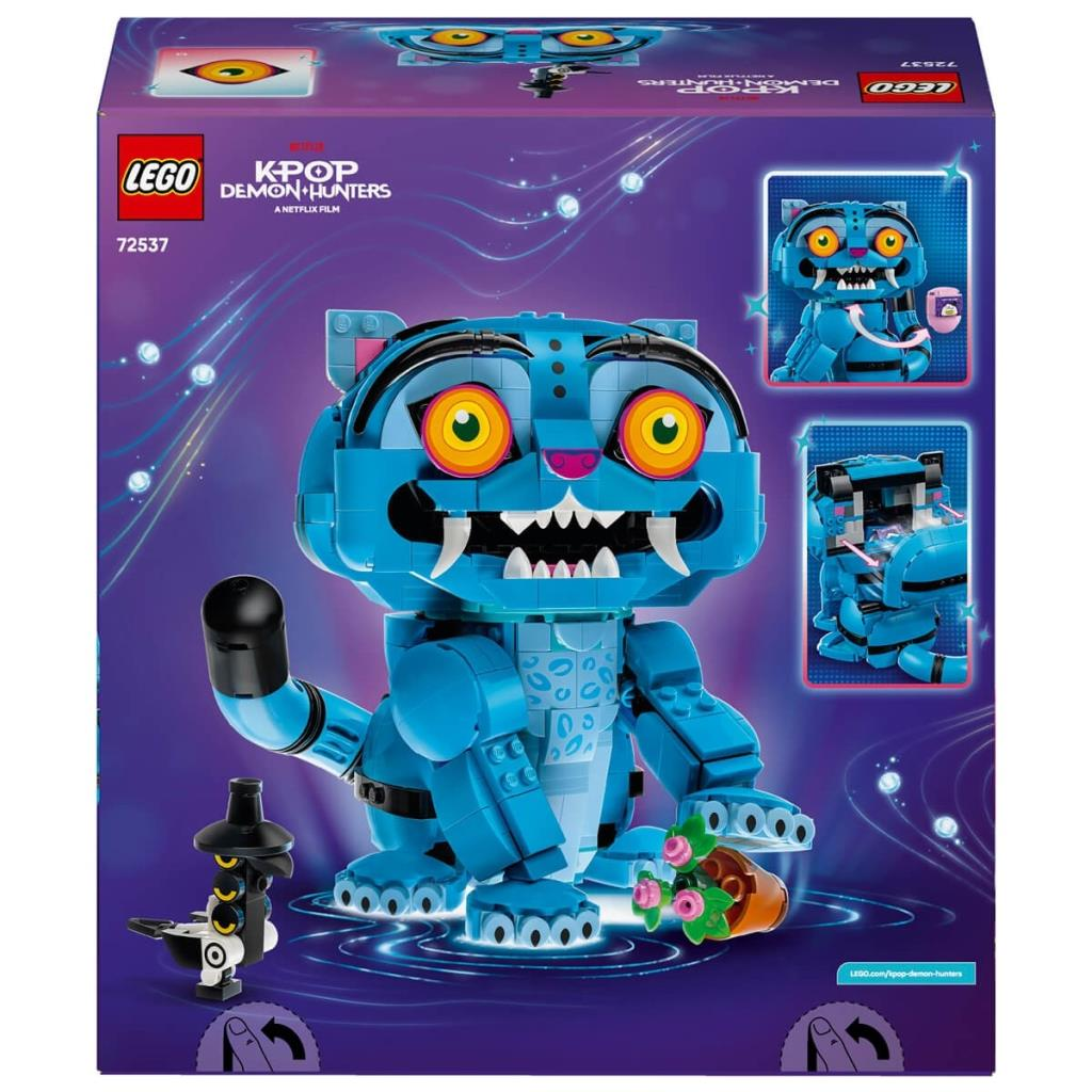 Sarı gözlü, büyük dişli ve küçük siyah minifigürlü büyük mavi kedi figürüne sahip Lego kutusu.