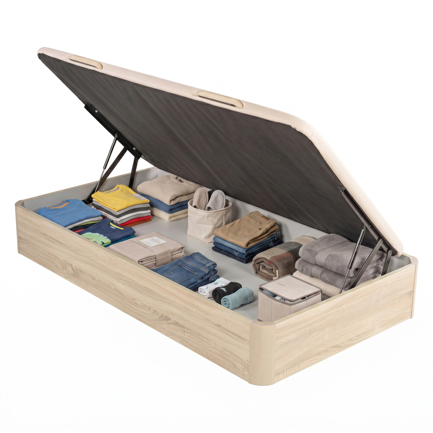Una base de cama de madera abierta con ropa doblada, toallas y pequeñas cajas organizadas.