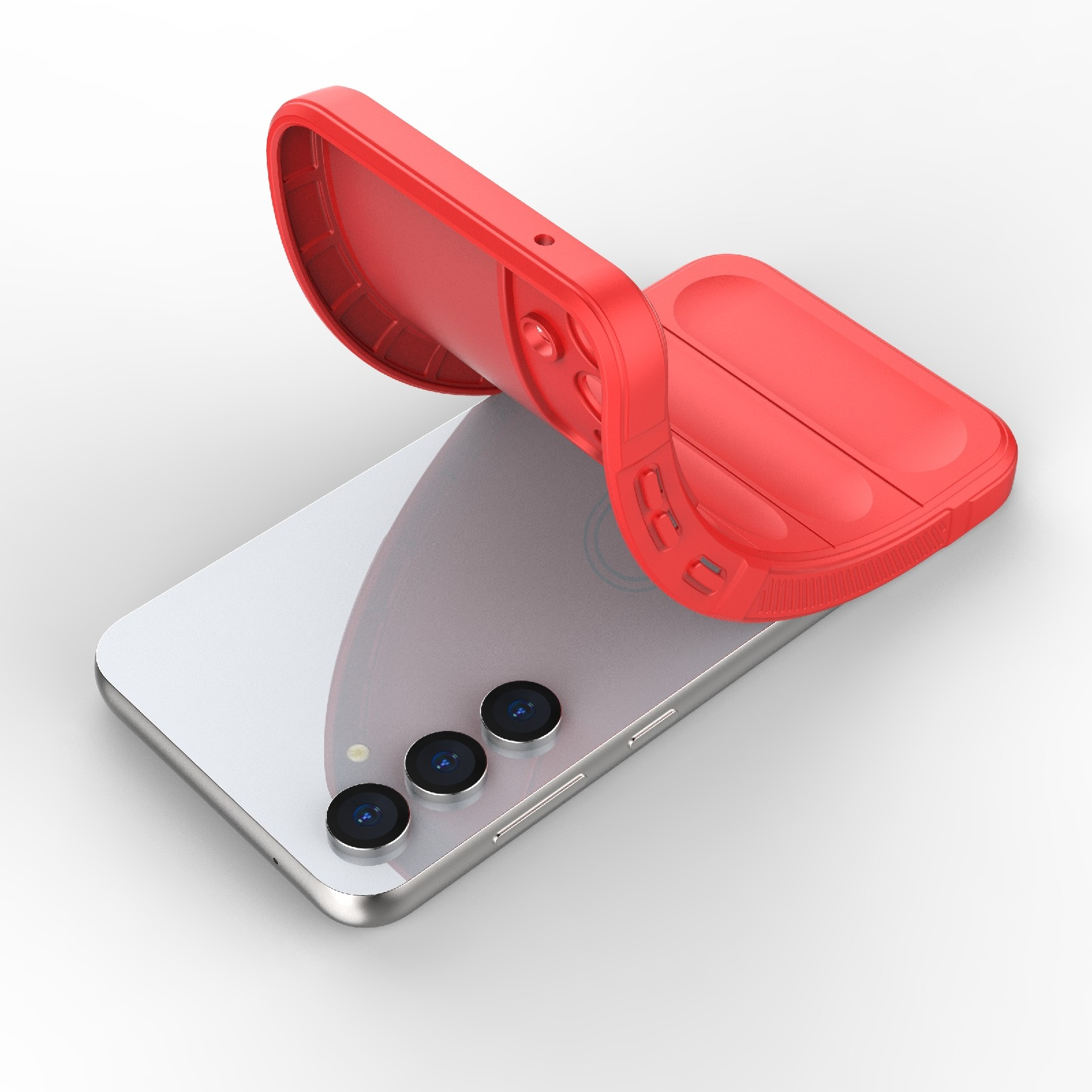 Ein weißes Smartphone liegt auf einer weißen Oberfläche, während eine rote Schutzhülle teilweise darüber geschoben wird.