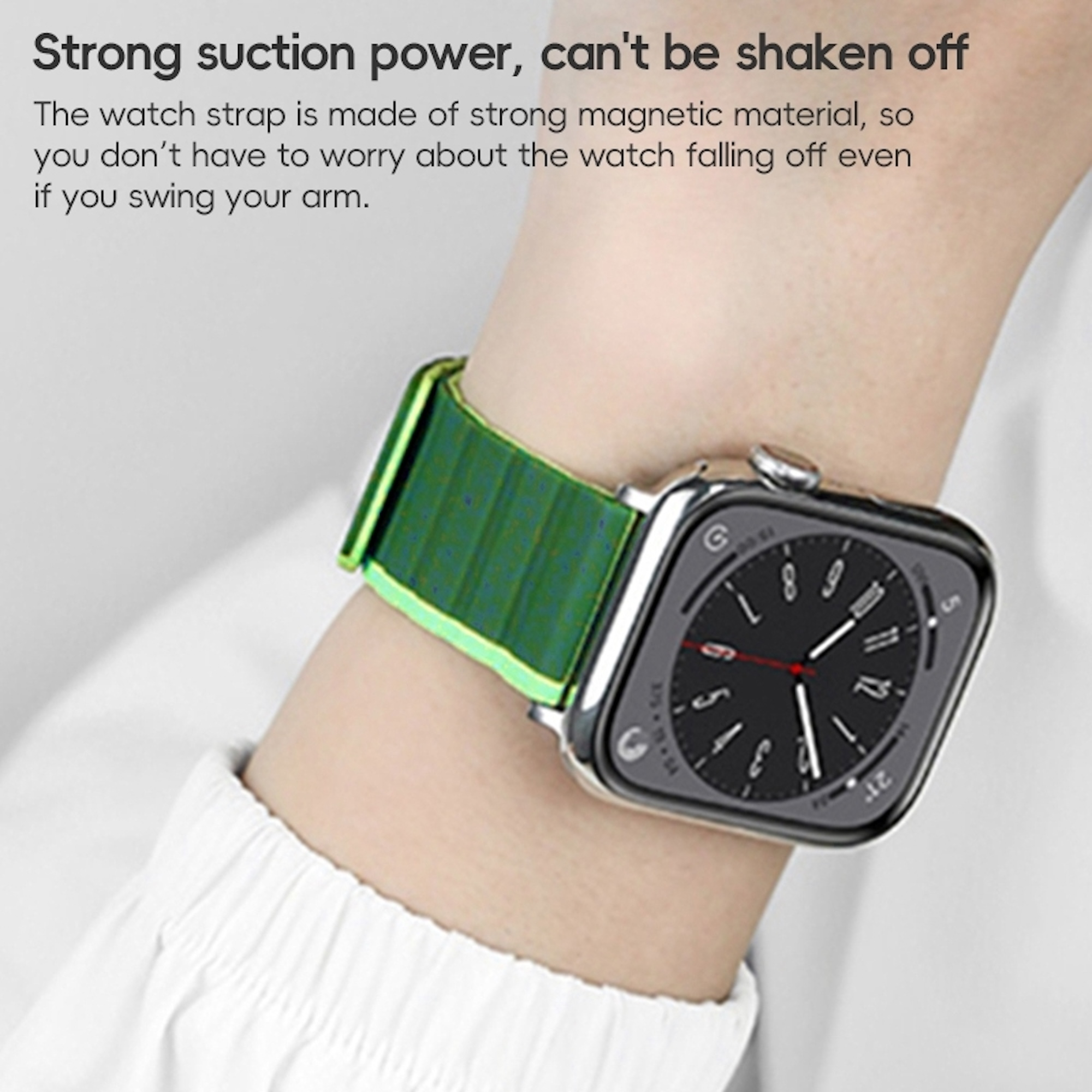 Eine Smartwatch mit grünem Armband am Handgelenk.