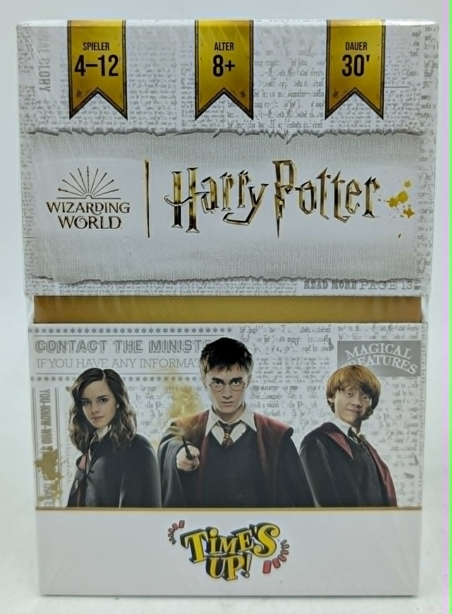 Harry-Potter-Spielverpackung mit Bildern von Hermine, Harry und Ron vor zeitungshintergrund.