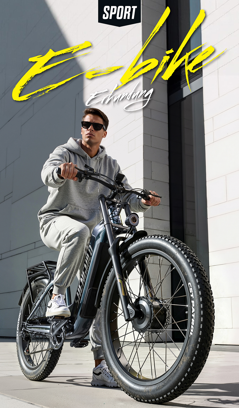Ein Mann im grauen Trainingsanzug fährt E-Bike an einem weißen Backsteingebäude, mit gelbem Text.