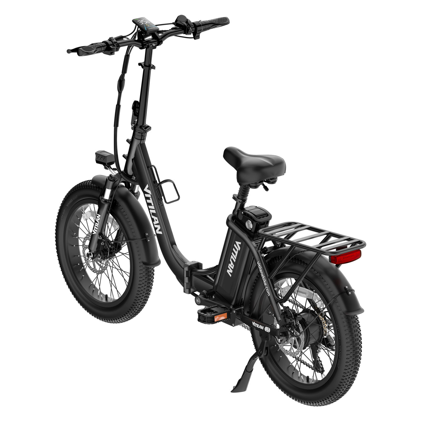 Una bicicleta eléctrica Vitilan negra con neumáticos gruesos, parrilla trasera y pantalla sobre fondo blanco.