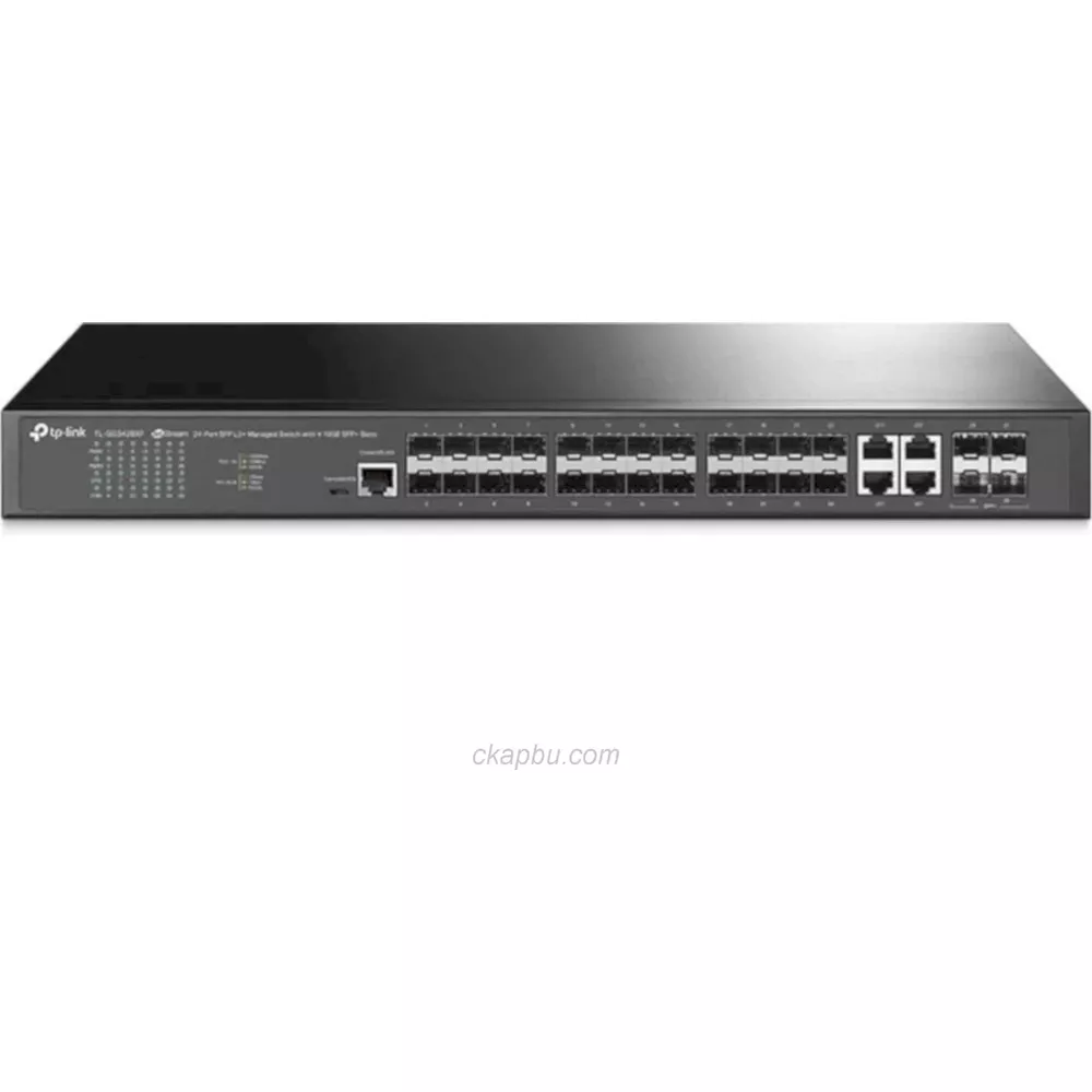 Uno switch di rete TP-Link nero con porte Ethernet e indicatori LED su una superficie bianca.