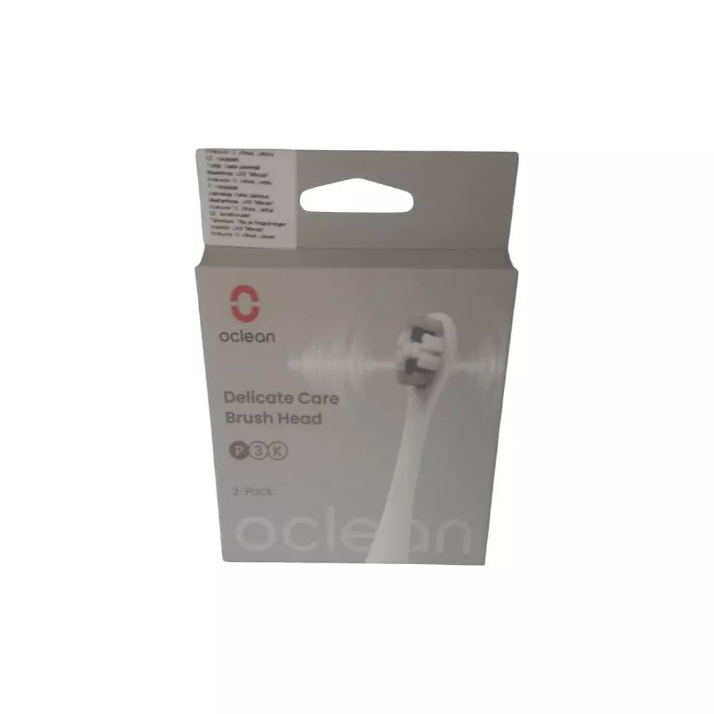 Graue Oclean Delicate Care Zahnbürstenkopf-Schachtel mit Branding und 2er-Pack-Aufschrift.