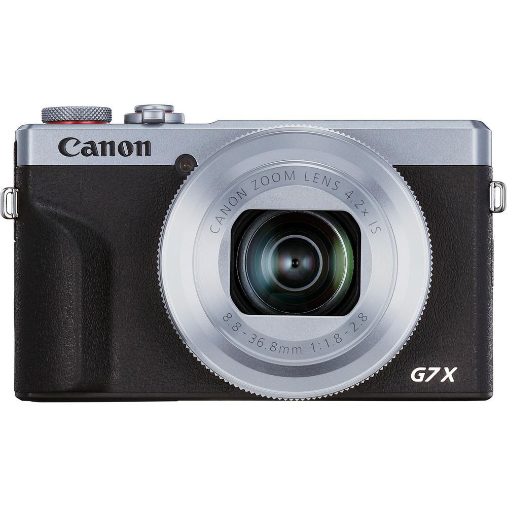 Frontansicht einer silber-schwarzen Canon PowerShot G7 X Mark III Kompaktkamera auf weißem Hintergrund.