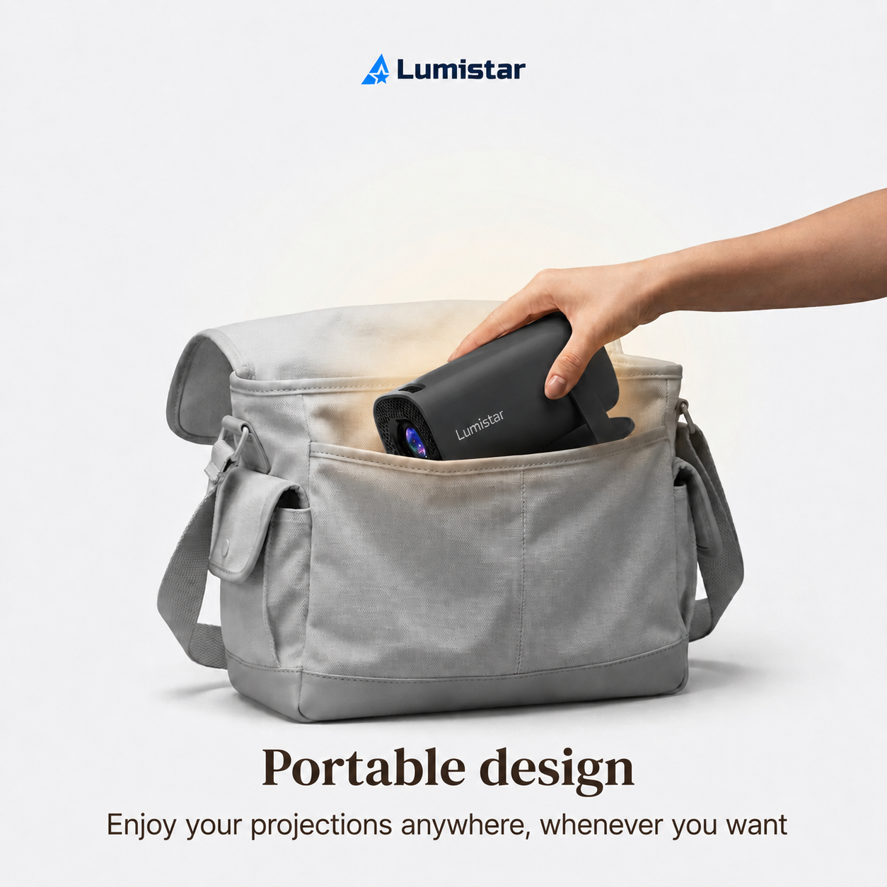 A hand places a black Lumistar projector into a gray messenger bag, with text promoting portable design.