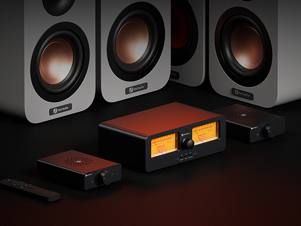 Schwarze Fosi Audio Verstärker mit orangefarbenen VU-Metern und Lautsprechern auf dunklem Tisch.