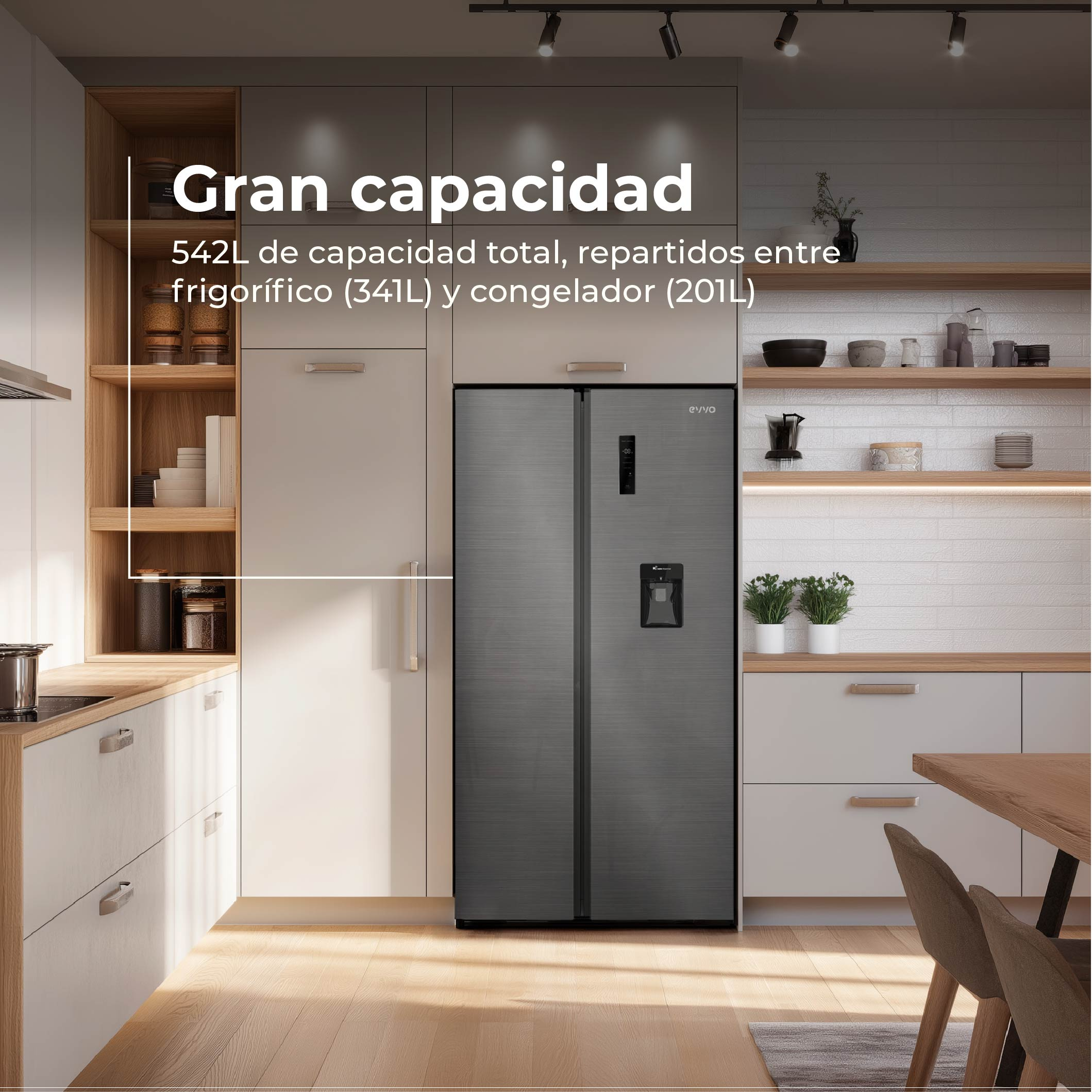 Un refrigerador moderno de dos puertas grises en una cocina luminosa con suelos de madera y armarios claros.