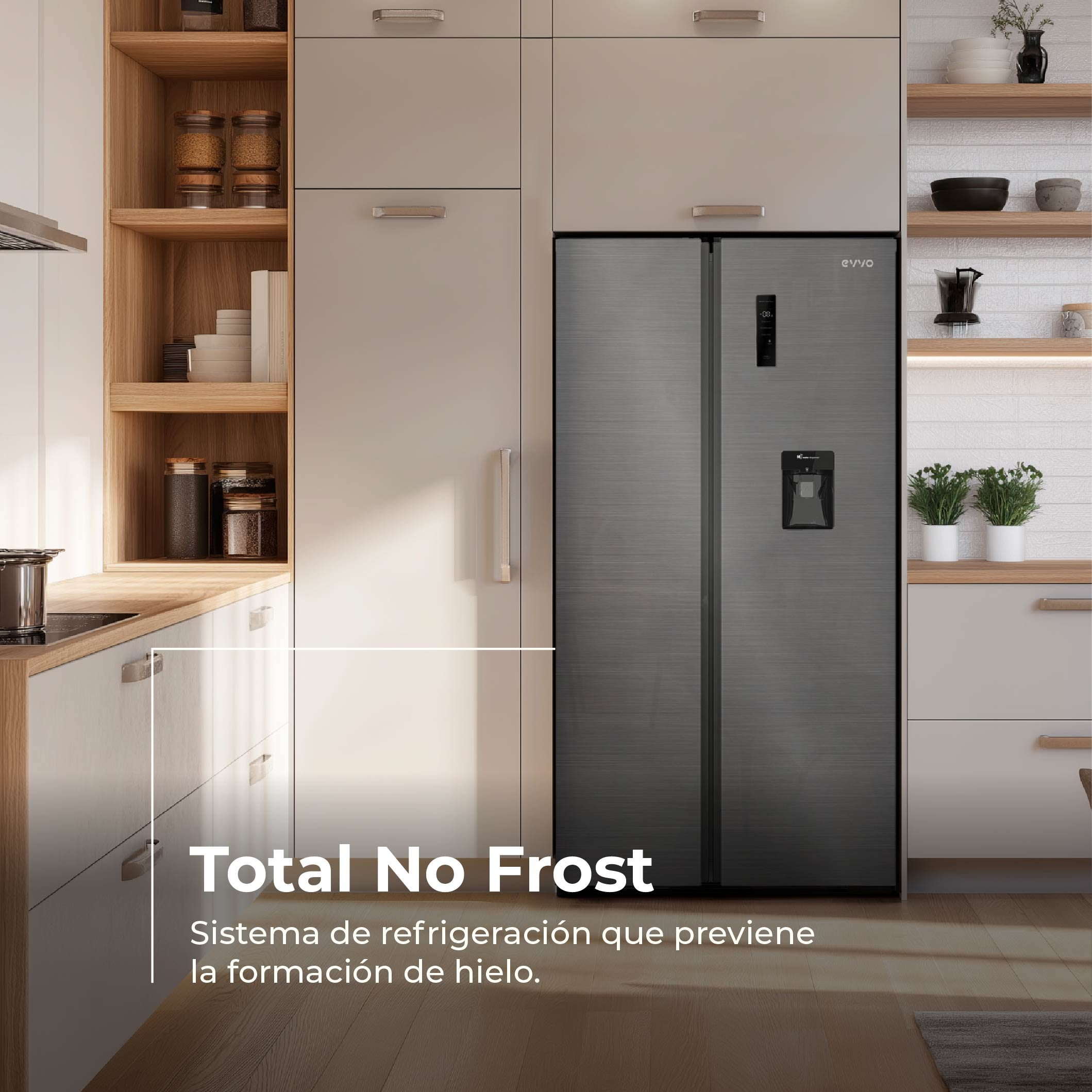 Cocina moderna con frigorífico gris de dos puertas, armarios claros y estantes de madera con tarros y plantas.