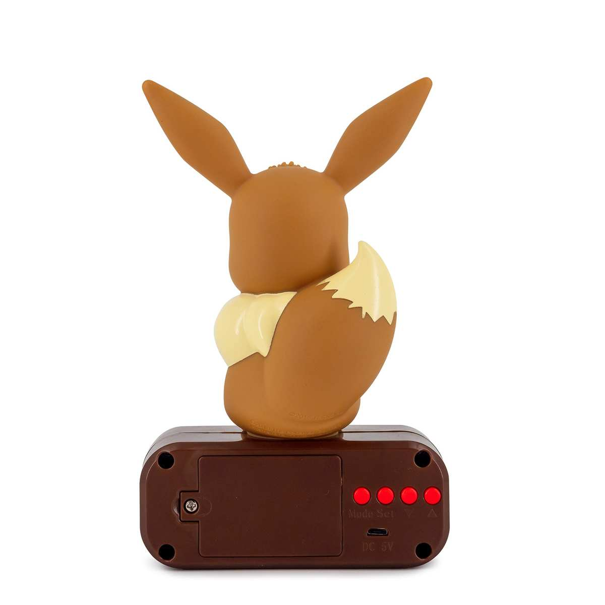 Tył figurki Eevee na brązowej podstawie z czerwonymi przyciskami i portem DC 5V na białym tle.