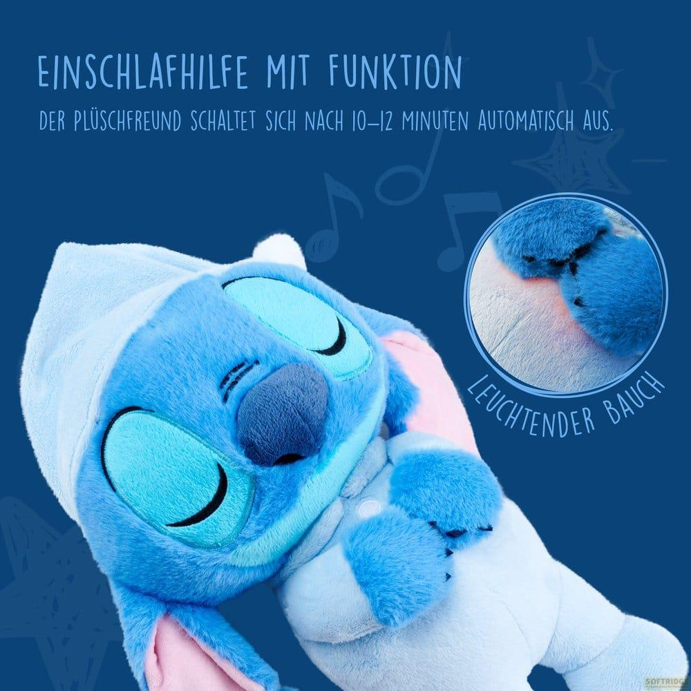 Ein blauer Plüschfreund mit Schlafhaube, geschlossenen Augen und einem leuchtenden Bauch auf blauem Hintergrund.