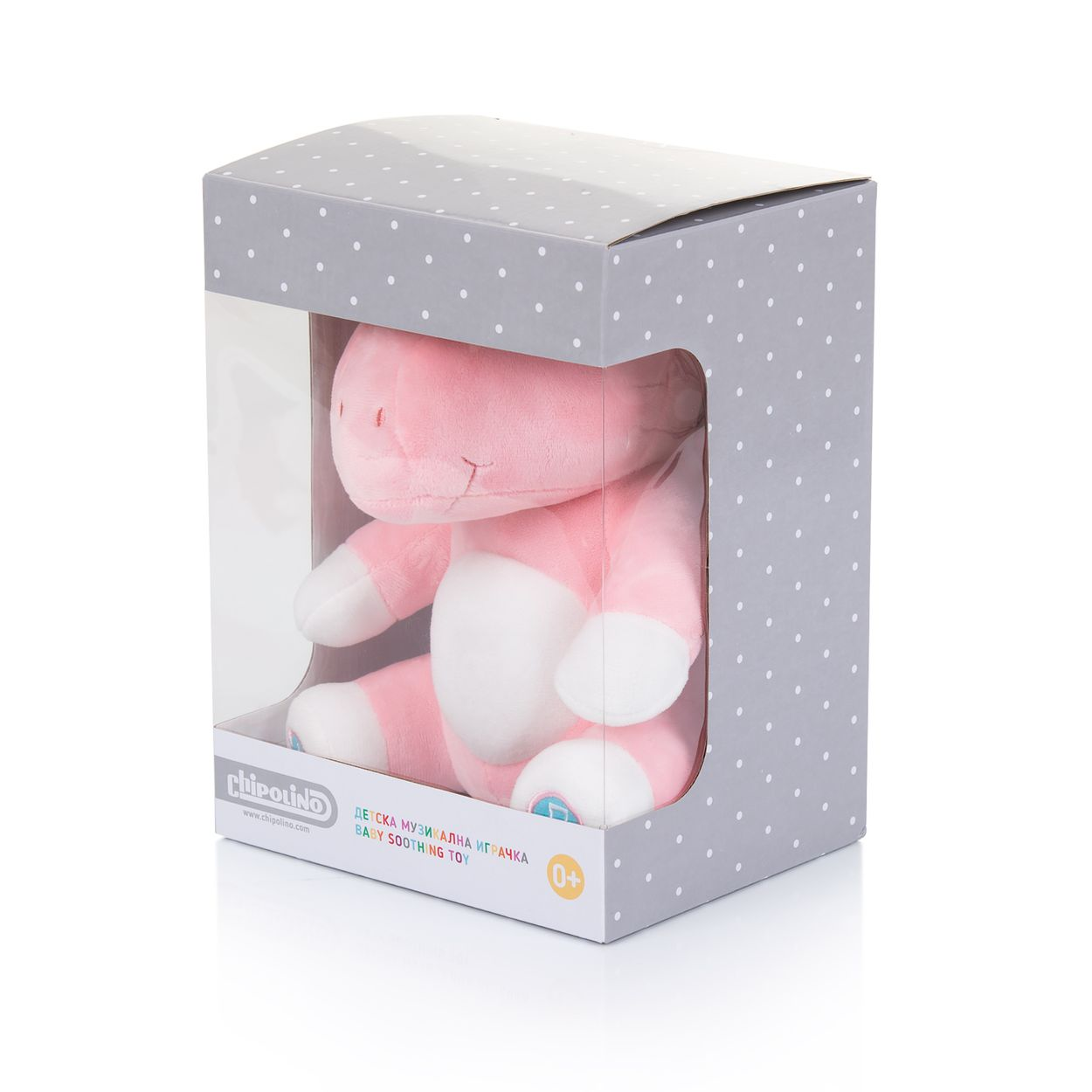Ein rosafarbenes Plüschtier in einer grauen, gepunkteten Geschenkbox mit Sichtfenster.