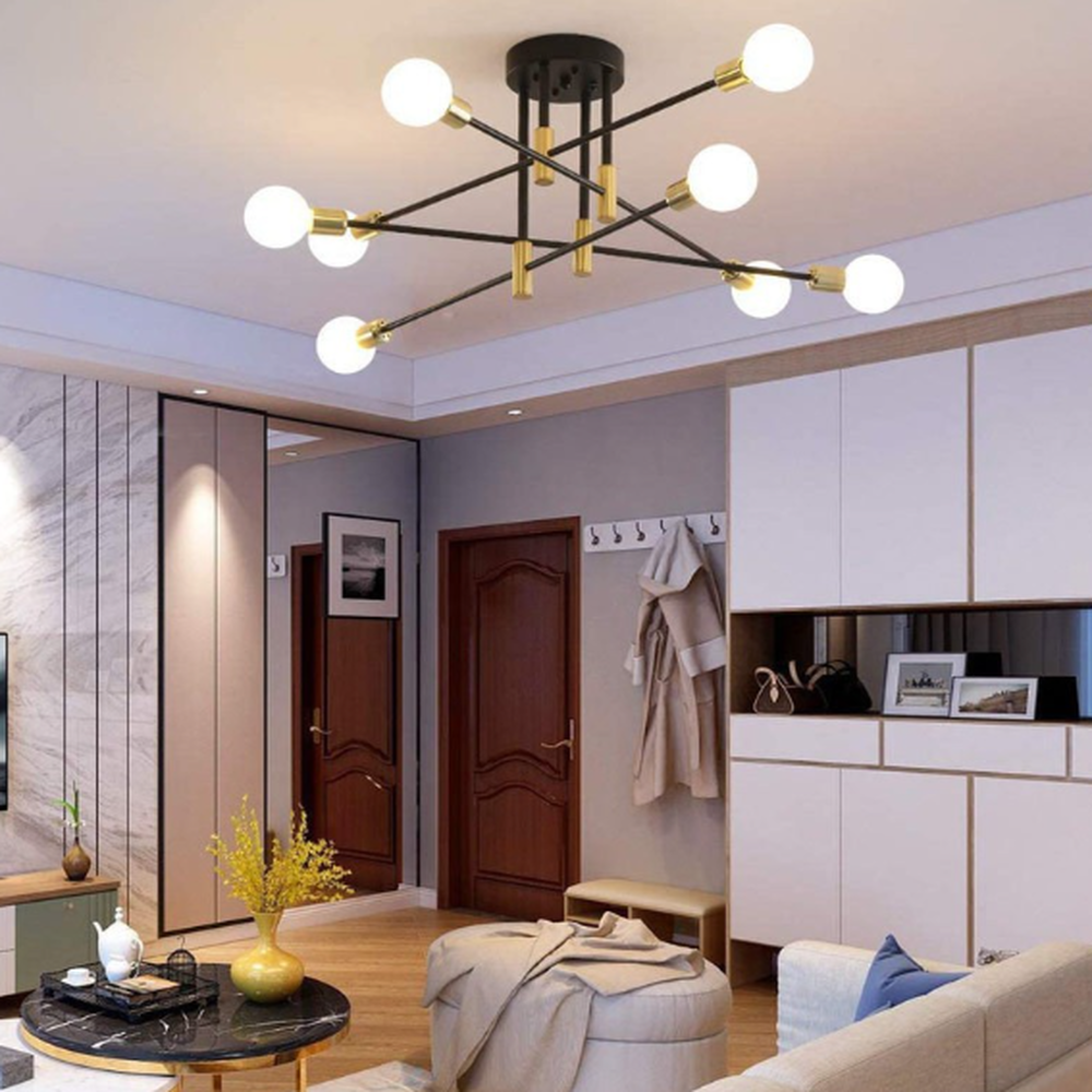 Moderne Deckenleuchte mit schwarzem und goldenem Gestell und runden Glühbirnen in einem stilvollen Flur.