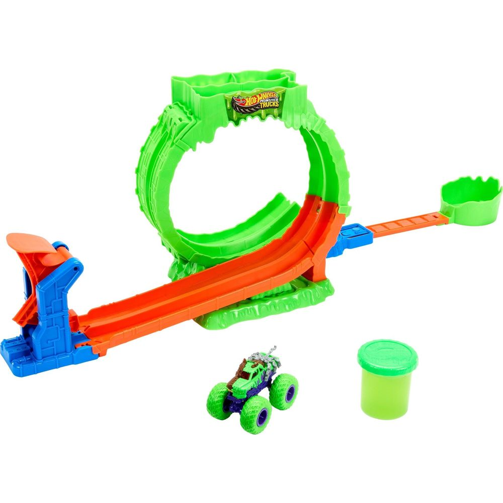 Hot Wheels Monster Trucks Spielset mit orangem und grünem Loopingset, kleinem Truck und grünem Schleimbehälter.