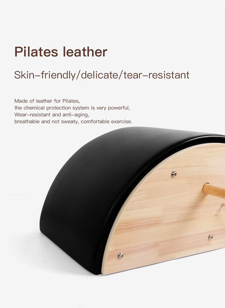 Un arco de pilates de madera con acolchado de cuero negro y texto sobre características.