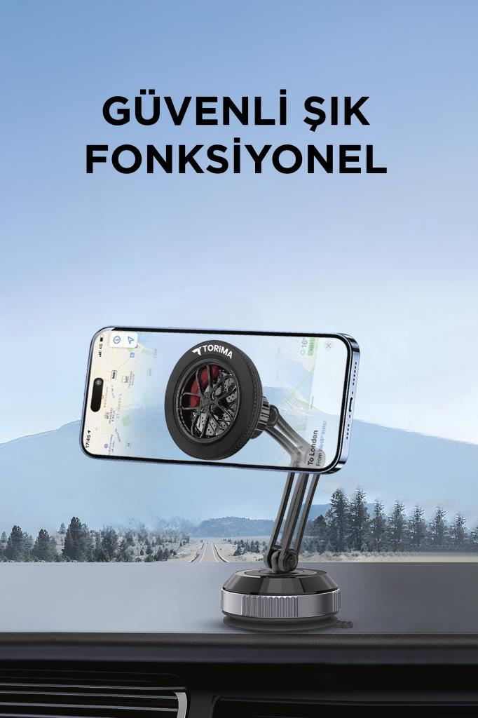 Dağ manzarasının önünde araç torpidosuna monte edilmiş akıllı telefon ve üstte Türkçe yazı.