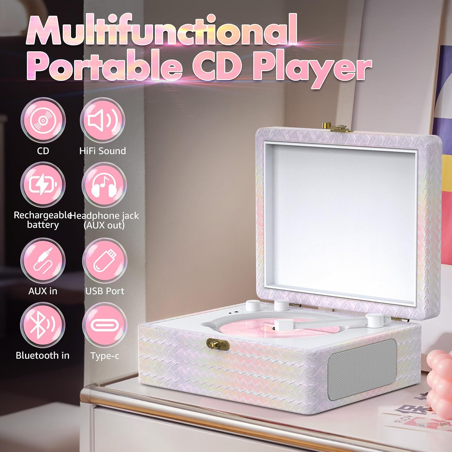 Ein multifunktionaler, rosa tragbarer CD-Player im Kofferdesign mit Symbolen für Funktionen auf der linken Seite.