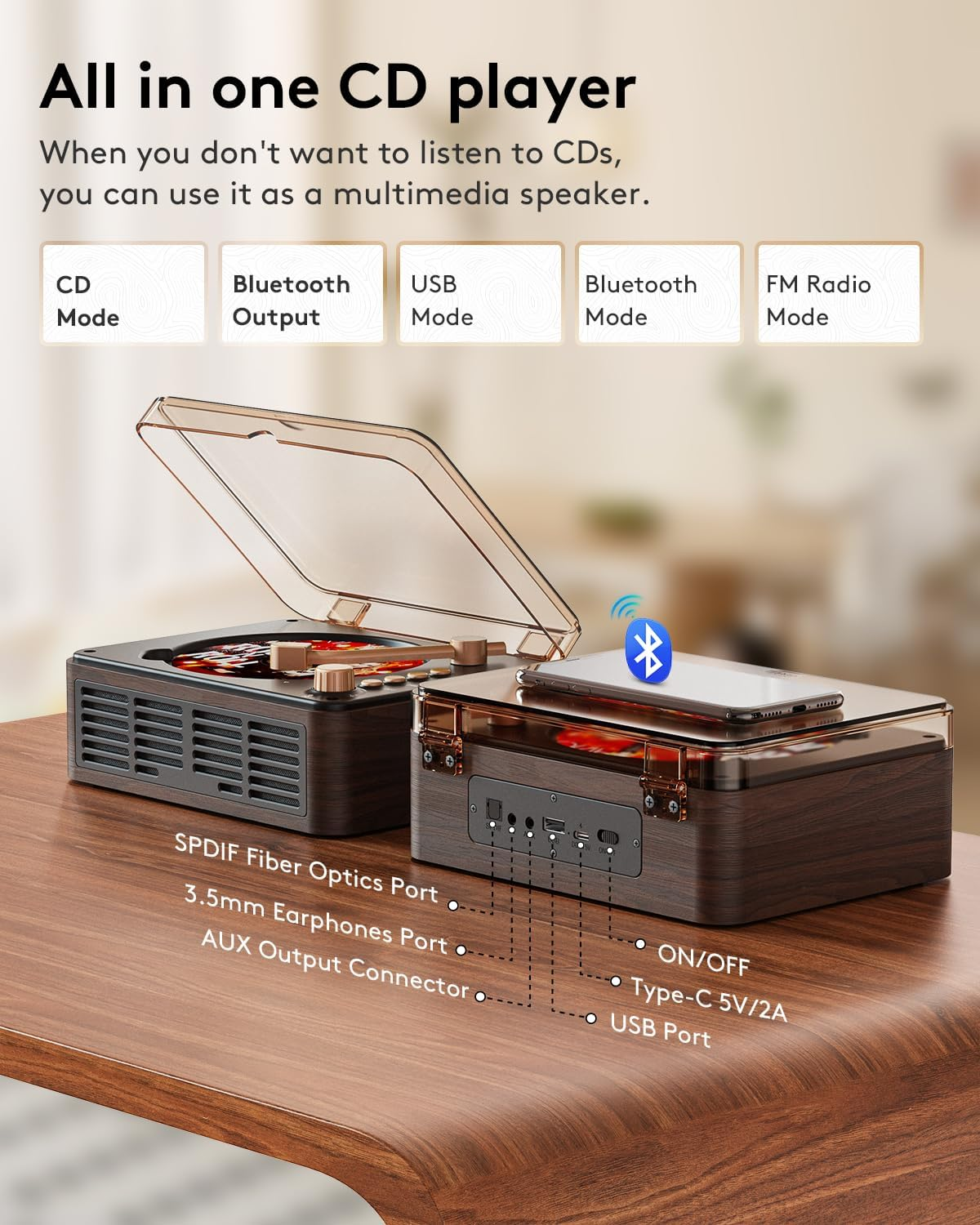 Ein All-in-One-CD-Player aus Holz mit verschiedenen Anschluss- und Modus-Optionen auf einem Holztisch.