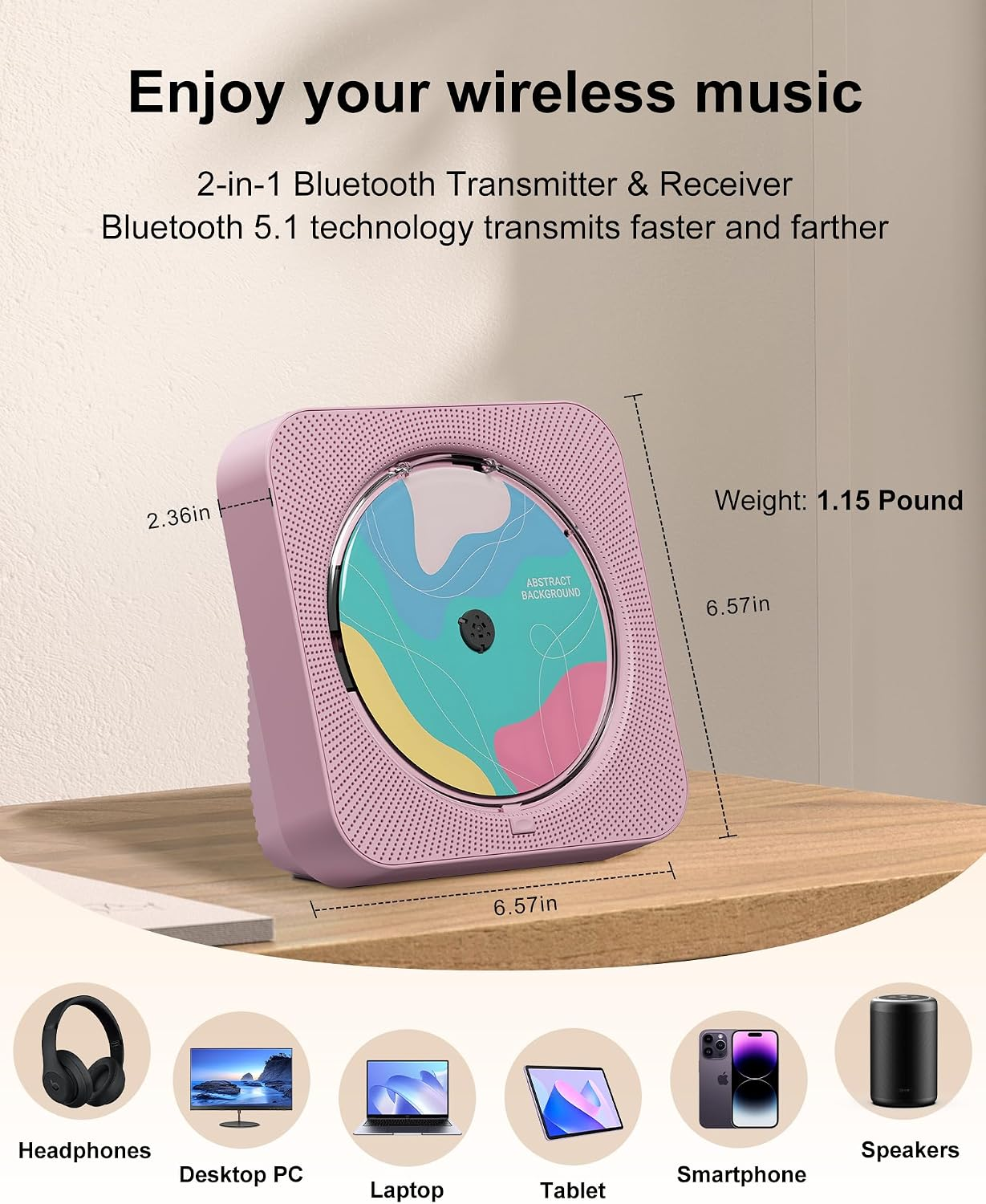 Ein rosa kabelloser CD-Player auf einer Holzoberfläche mit Produktabmessungen und Kompatibilitätssymbolen.