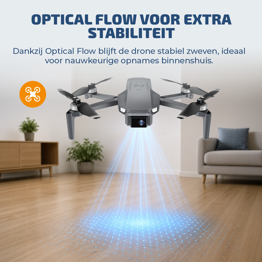 A grey drone hovers indoors, projecting a blue grid light onto the wooden floor.