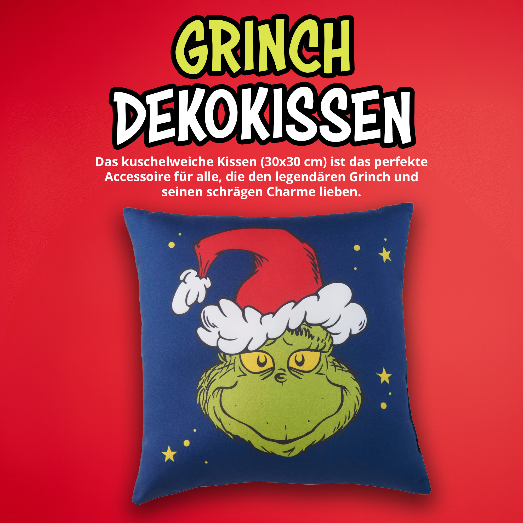 Ein blaues Zierkissen zeigt einen grünen Grinch mit Weihnachtsmütze vor rotem Hintergrund mit deutschem Text.