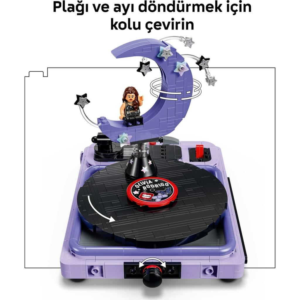 Un giradischi Lego viola con un disco nero rotante e una falce di luna con una minifigura.