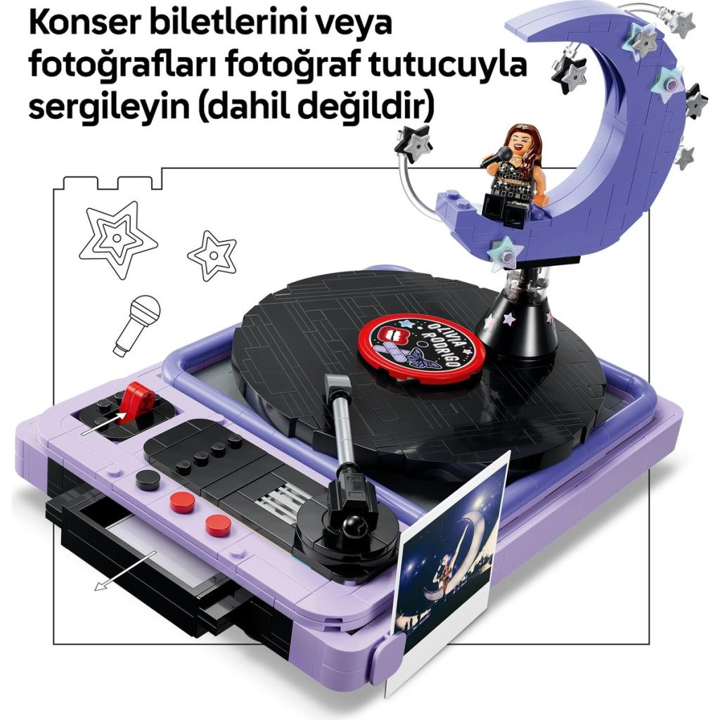 Giradischi Lego viola con una minifigura sulla luna e testo sopra.