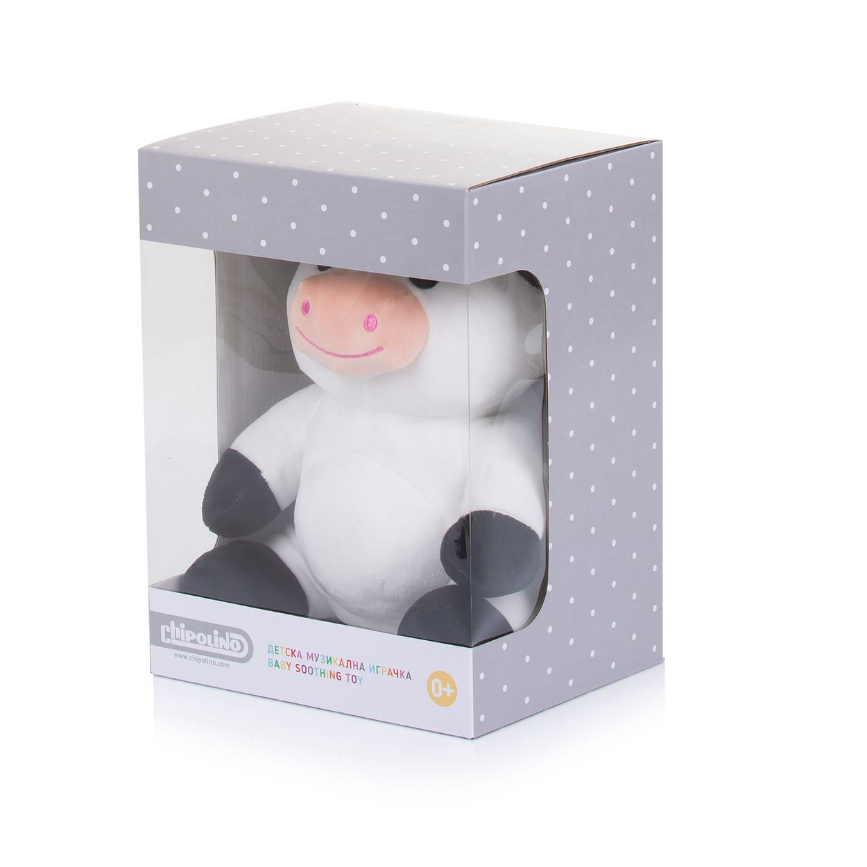 Ein weißes Plüschtier-Kuh in einer grauen gepunkteten Geschenkbox mit durchsichtigem Fenster.