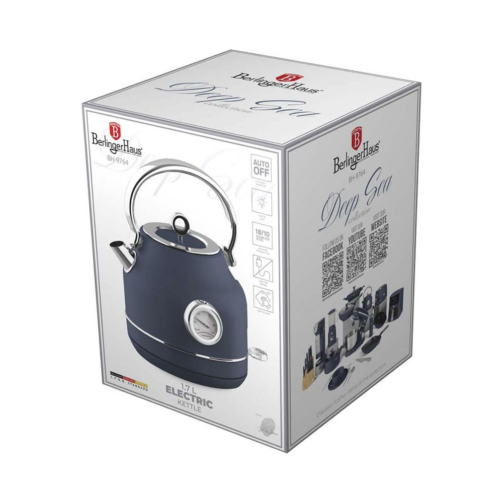 Una scatola di prodotto bianca mostra un bollitore elettrico blu con termometro integrato e manico.