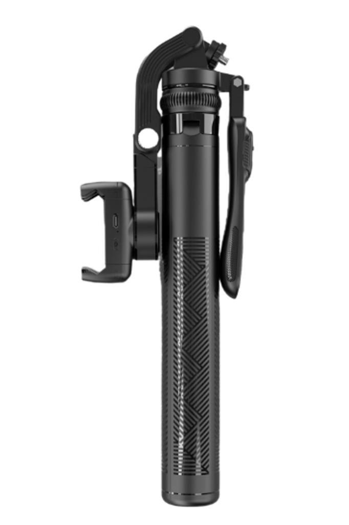 Beyaz arka planda entegre telefon tutuculu kompakt siyah selfie çubuğu ve tripod.