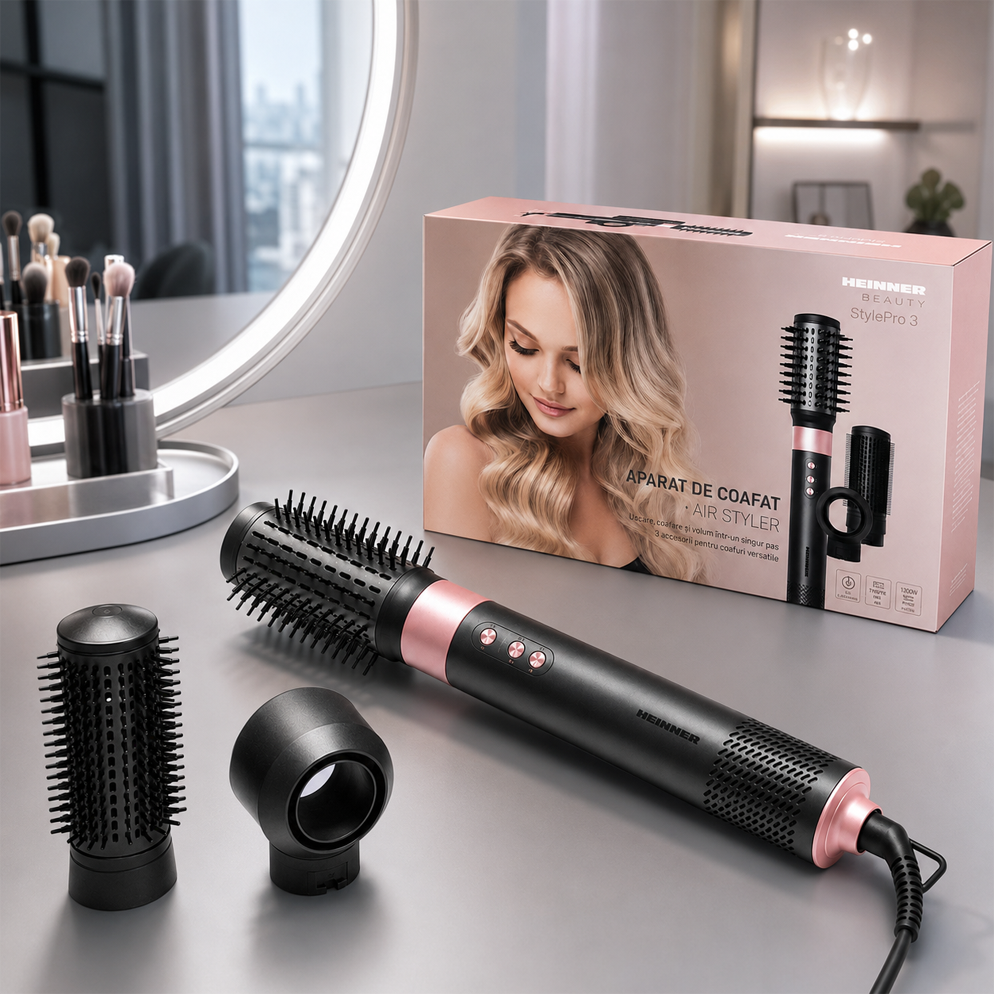 Brosse soufflante Heinner StylePro 3 avec deux accessoires et sa boîte sur une table.